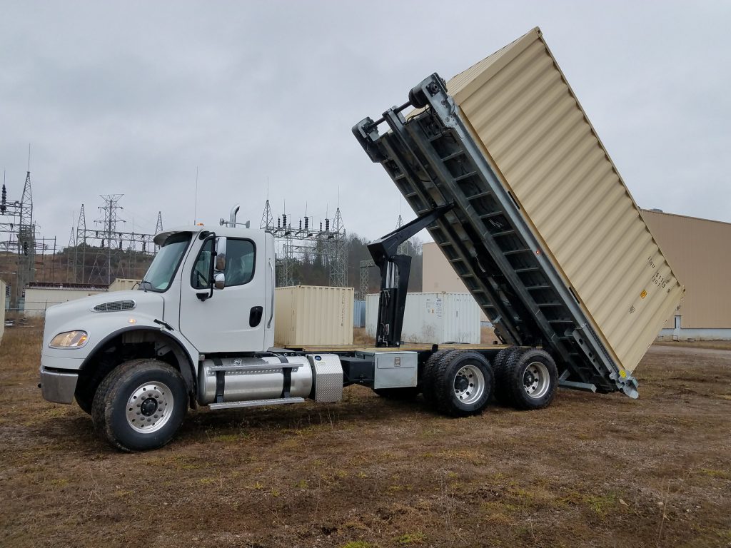 A QuickLoadz 20k Super Bed with the bed at a high angle with a shipping container loaded. The container is locked in and not going anywhere.