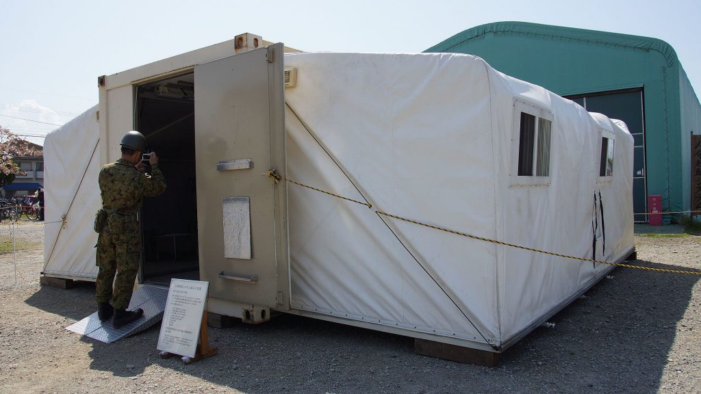 Shipping container expandable shelter