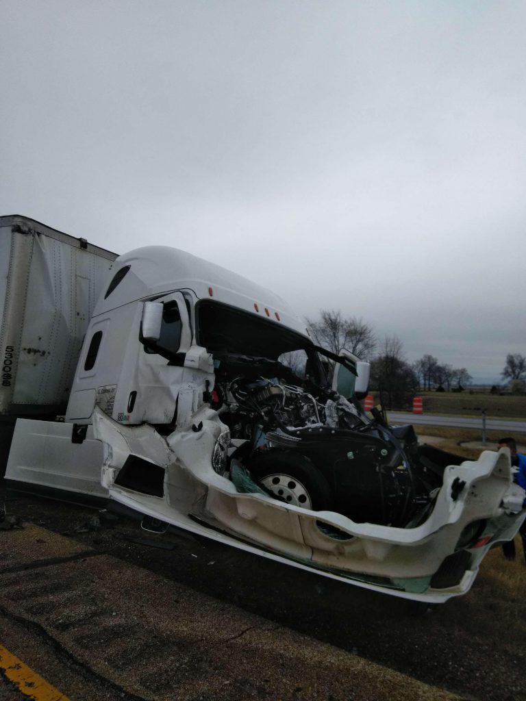 The gnarled remains of the semi that rear ended a QuickLoadz trailer. 