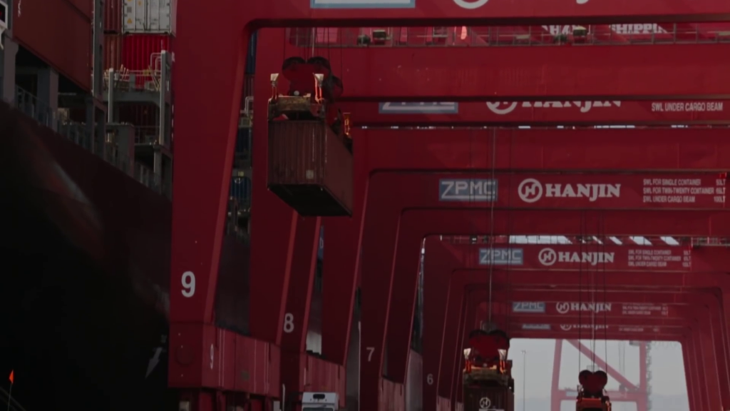 Container carried by crane